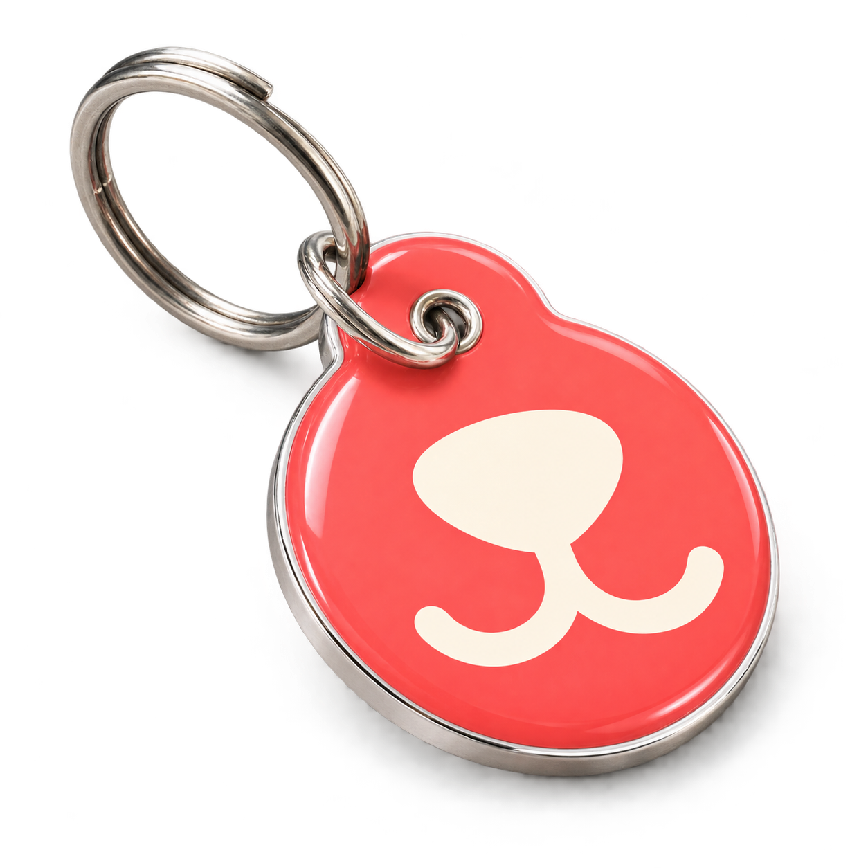 A glossy coral Snootiki NFC key at a three-quarter angle, with a cream snoot symbol, silver rim, and lifted key ring